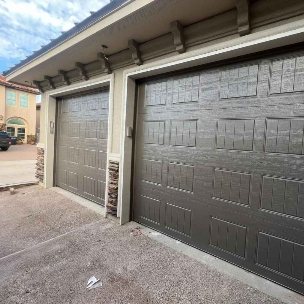 Two dark brown carriage-style garage doors